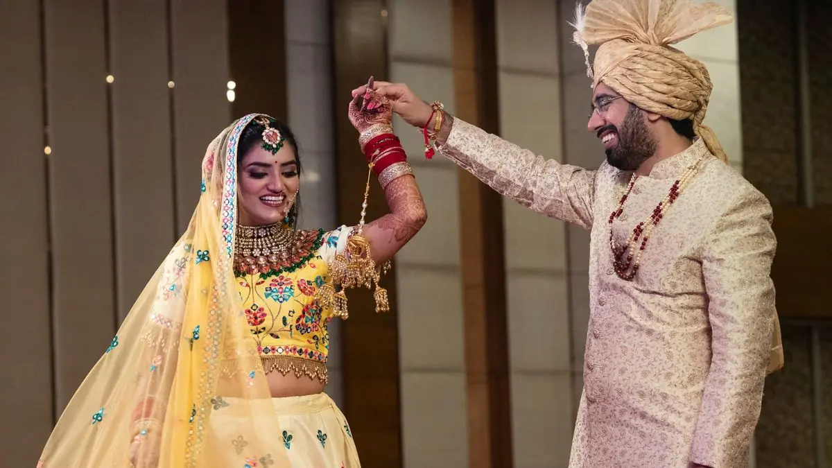 A couple dancing together in a decorated banquet hall