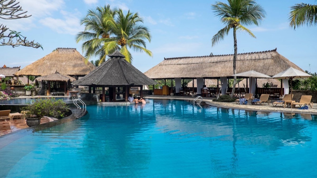 Resort pool and landscaped grounds used for celebrations